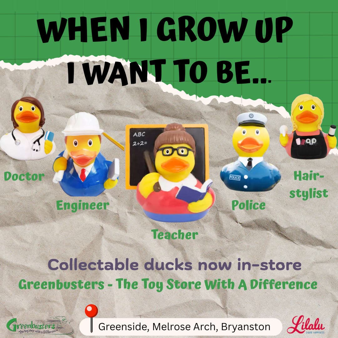 A group of rubber ducks sitting on top of a piece of paper
