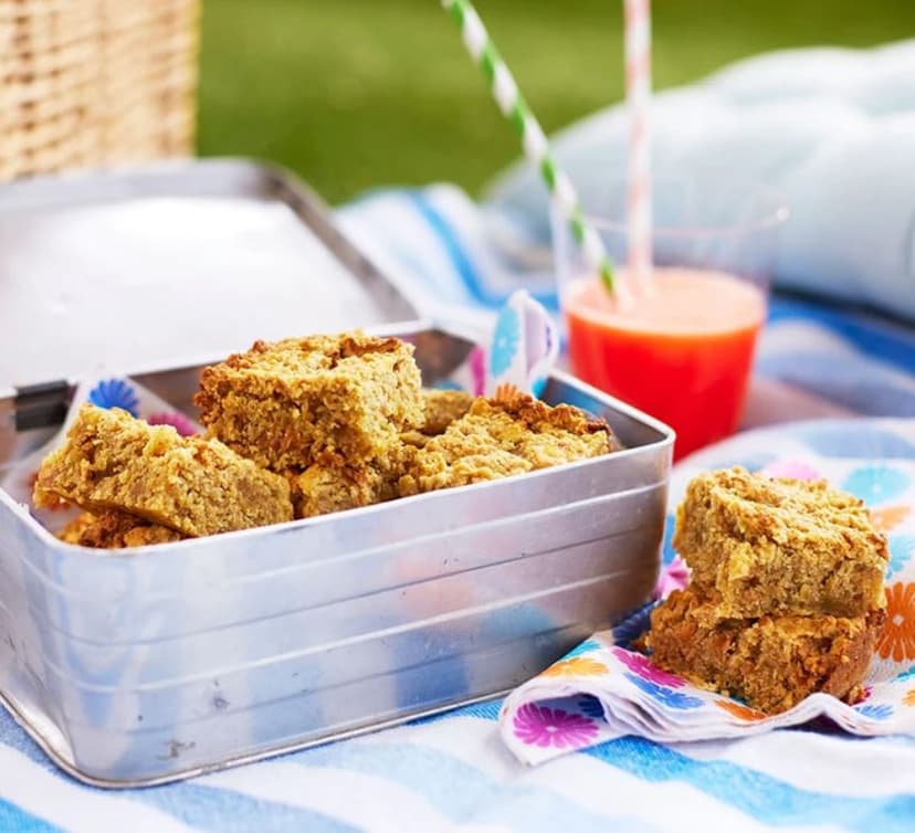 A tin of food sitting on top of a table