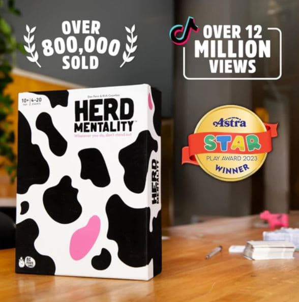 A black and white box sitting on top of a wooden table